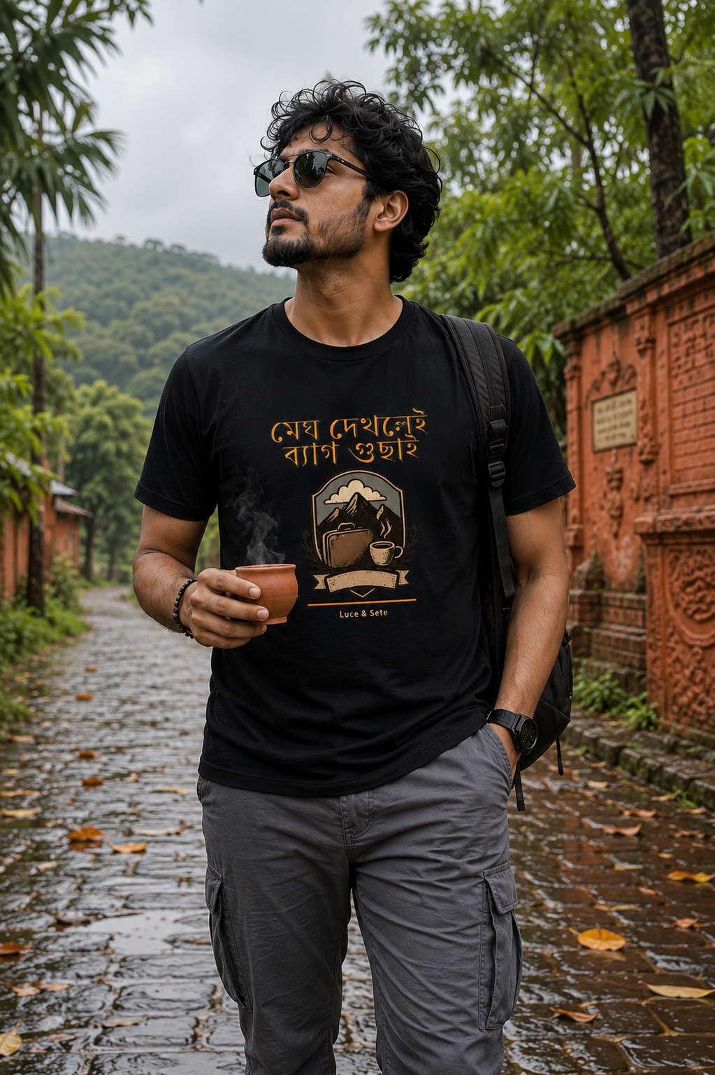 LUCE & SETE GPT mockup 1 - মেঘ দেখলেই ব্যাগ গুছাই Graphic T-Shirt for Men & Women | Bengali Travel Streetwear - 440_9389663781101_unisex-stretch-t-shirt-148_BENGALI_front_HERO_20260602_092237.png