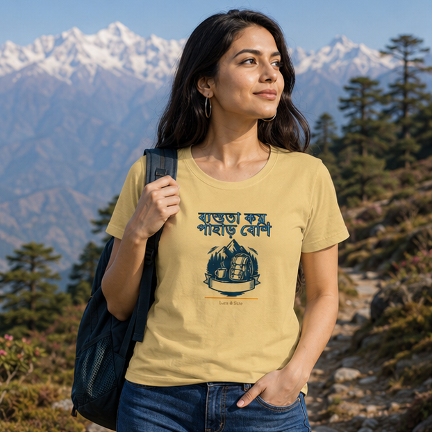 LUCE & SETE GPT mockup 1 - ব্যস্ততা কম পাহাড় বেশি Classic Graphic T-Shirt for Women | Travel Freedom Streetwear - 476_9391316205805_womens-classic-t-shirt-50_BENGALI_GRID_20260605_063417_01_row1_col1.png